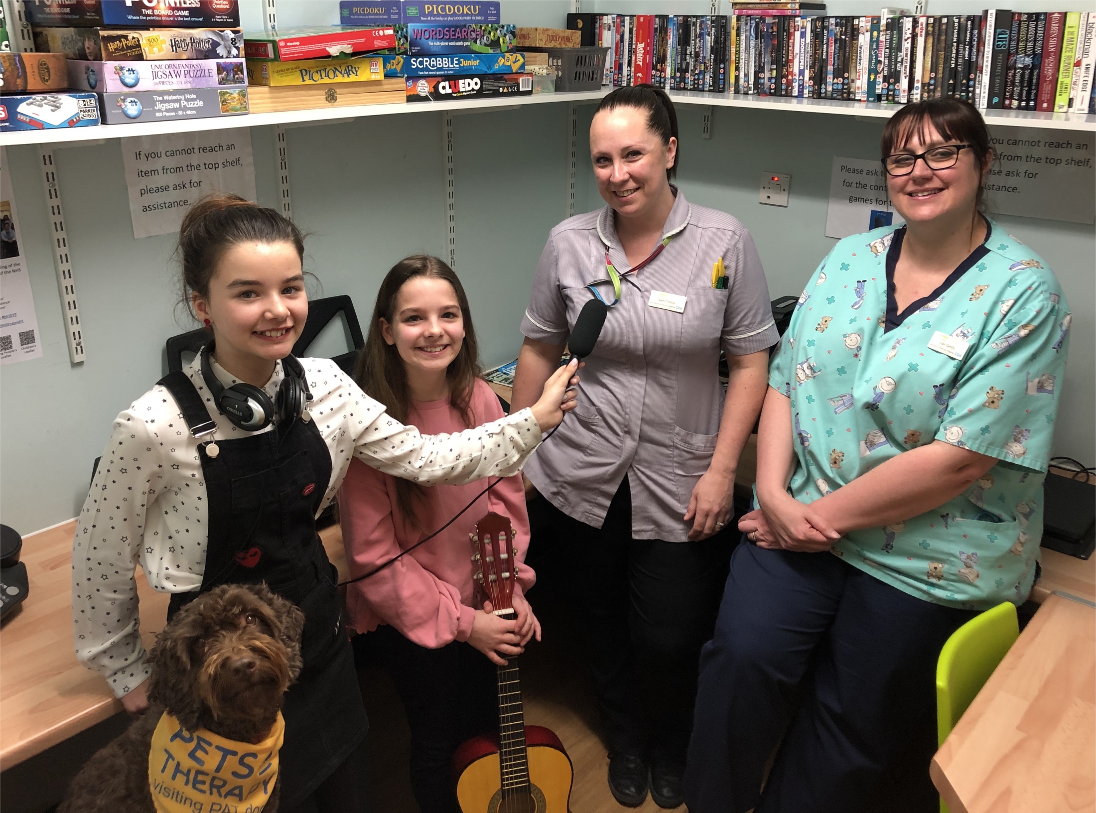 Kids presenters at Neptune Ward with staff